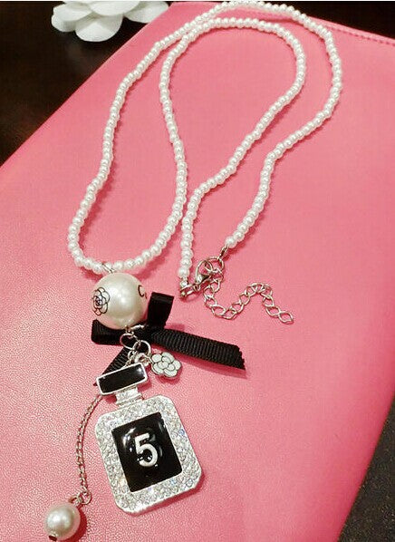 Perfume Bottle Shape Printed Number White Pearls With Little Black Bow
